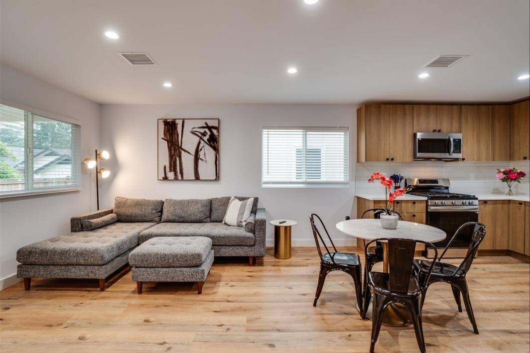 Open living and kitchen in a Rose City Housing home — Rebuild Crews